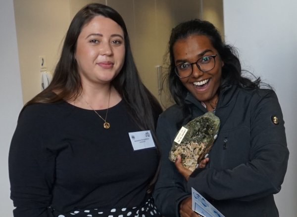 Priya with her award for best oral presentation at GESSS SA